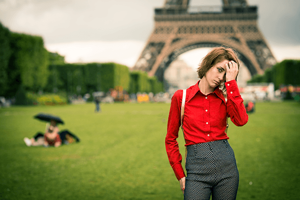 portrait of woman on the Champs de Mars, Eiffel tower in the background