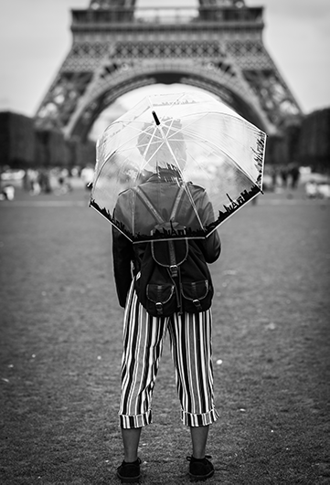 portrait of a woman, from the back, Eiffel tower in the background